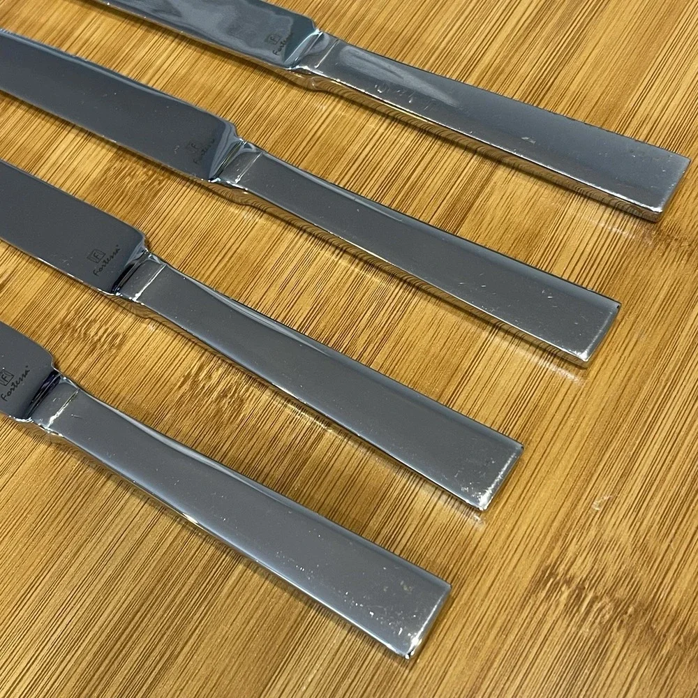 Lot Of 4 Fortessa SCALINI Table Knives Stainless Flatware Stamped Front Logo